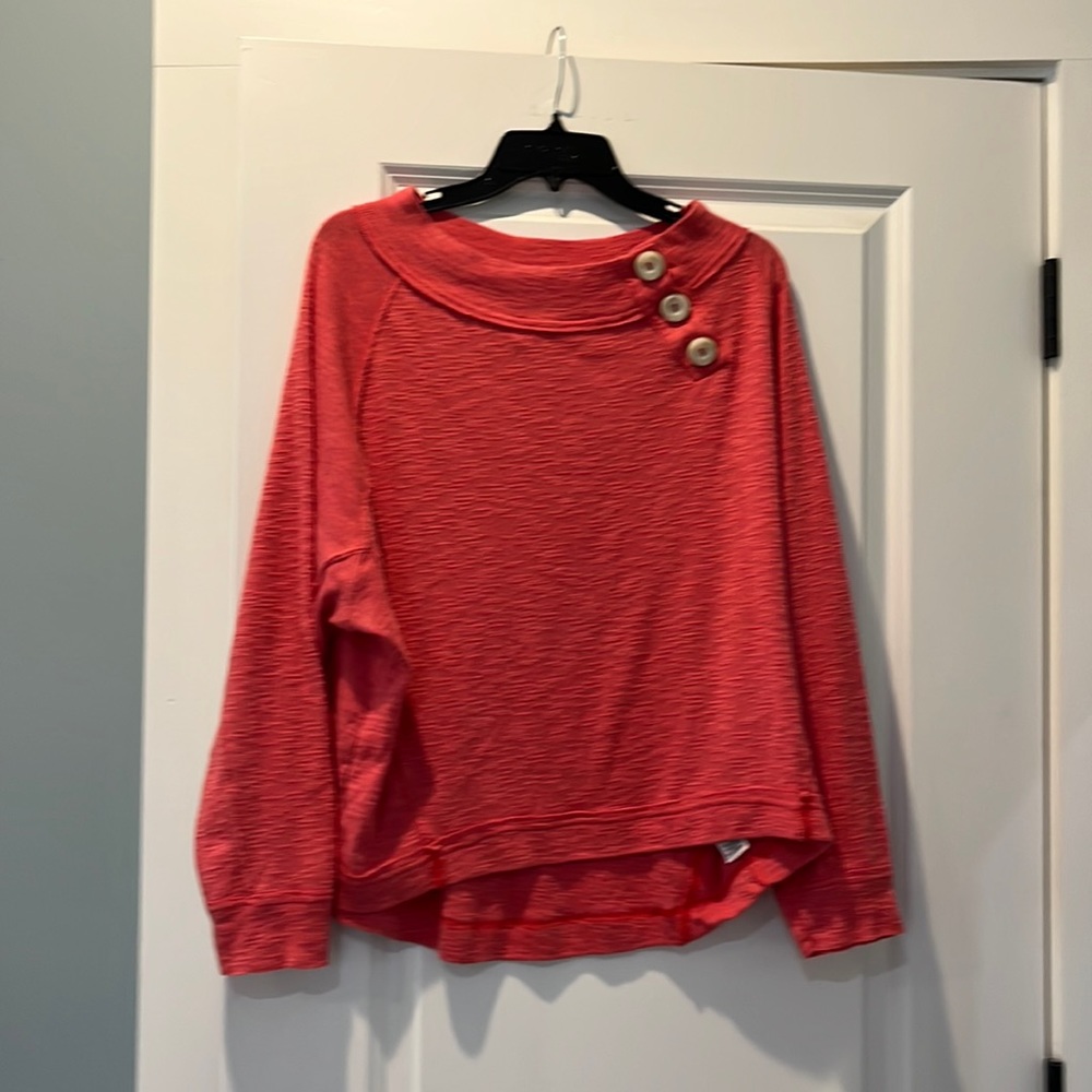 Coral color sweatshirt with cute button detail
